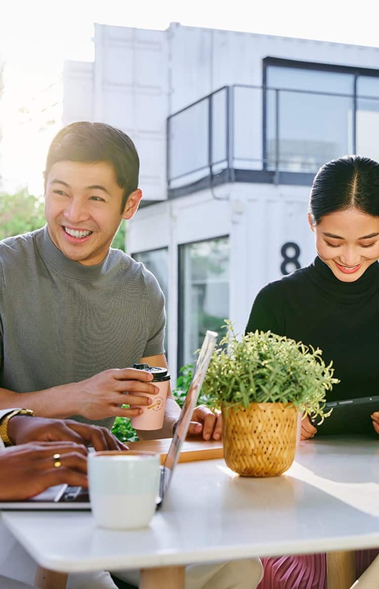 Employees collaborating in a modern workplace at Dubai