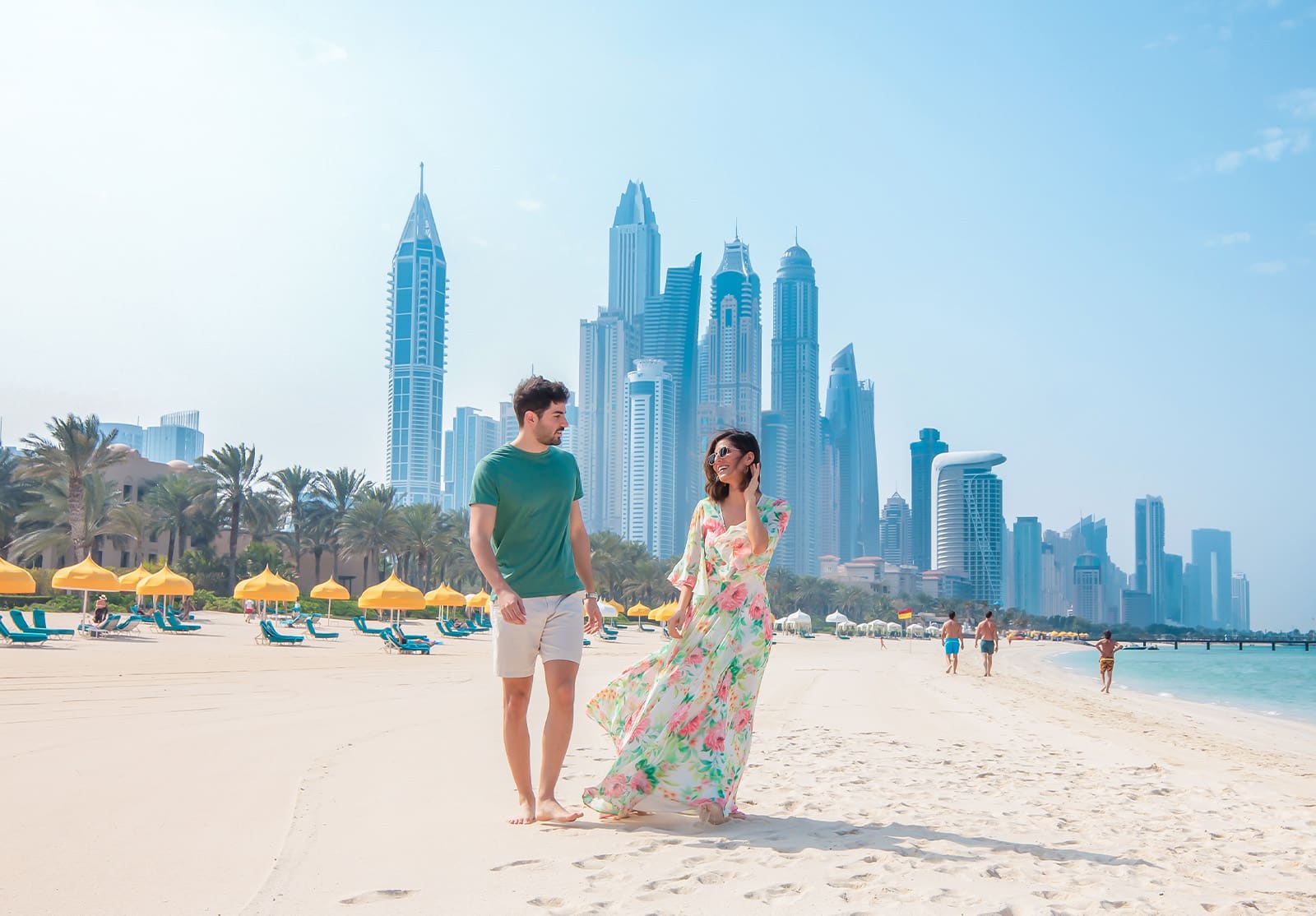 beach friends walking dubai