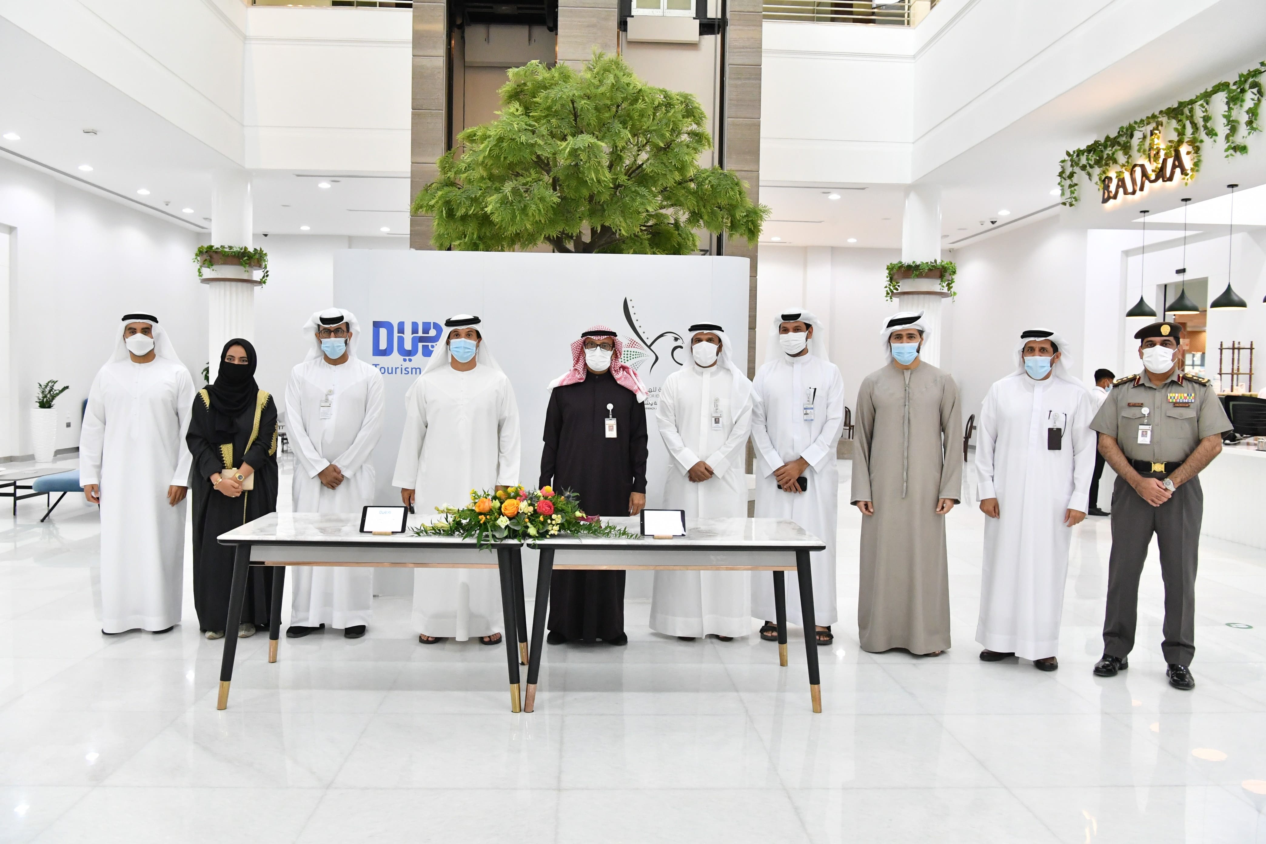 he-major-general-mohammed-ahmed-al-marri-and-he-helal-saeed-almarri-with-officials-of-gdrfadubai-and-dubai-tourism-during-the-signing-ceremony