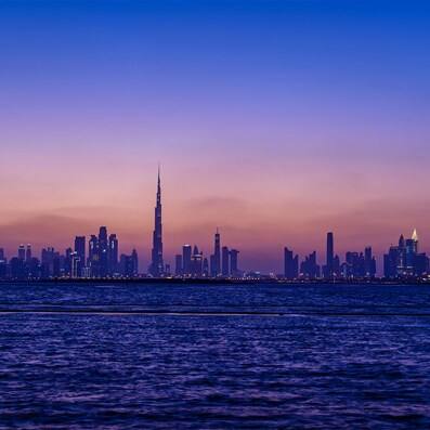 dtcm-dubai-tourism-performance-report-jun19-header-skyline-sub-sunset-small