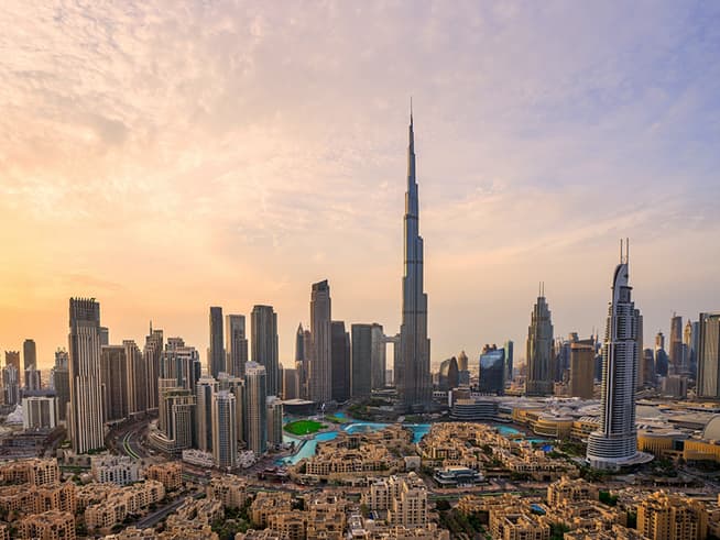 Panoramic view of Downtown Dubai with the Burj Khalifa at sunset