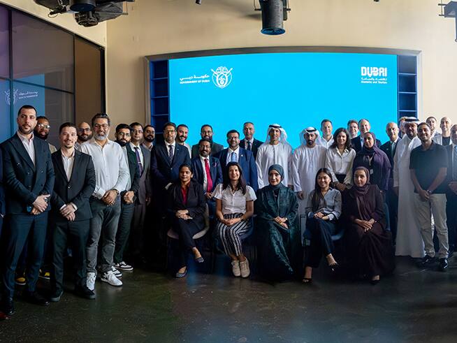 Entrepreneurs and business leaders posing at a networking event