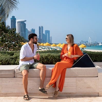 Couple enjoying sun at Drift beach Club Dubai